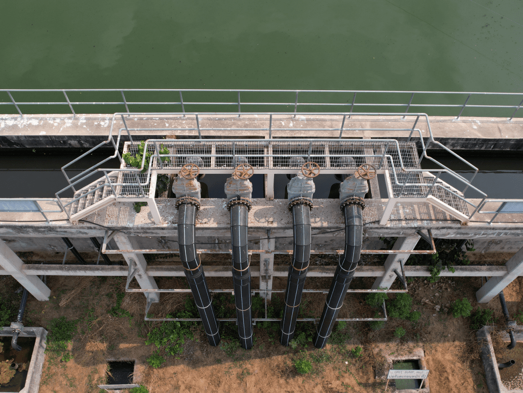 Four large pipes above water channel