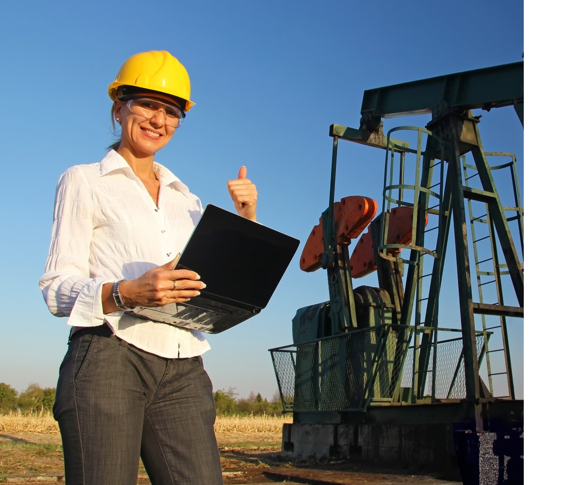 Engineer in hard hat near oil rig